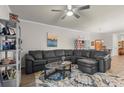 Cozy living room featuring a large sectional sofa and stylish decor at 1078 Saltgrass Way, Myrtle Beach, SC 29588