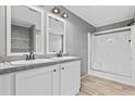 Elegant bathroom featuring a double sink vanity, modern fixtures, and a walk-in shower at 1301 Rabbit Ln., Conway, SC 29526