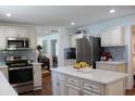Spacious kitchen with stainless appliances, large island, and ample counter space for meal preparation at 1600 Beaver Rd., Myrtle Beach, SC 29577