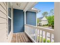 View from private balcony overlooking well-maintained grounds and neighboring home at 1654 Low Country Pl. # C, Myrtle Beach, SC 29577
