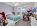 Bright bedroom with ample natural light, providing a comfortable and inviting space at 1898 Moonseed Dr., Longs, SC 29568