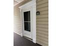 Inviting condo entryway with a white door and decorative trim at 2498 Coastline Ct. # 301, Murrells Inlet, SC 29576