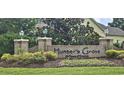 A beautiful brick sign marks the entrance to the Hunter's Grove community at 309 Outboard Dr., Murrells Inlet, SC 29576