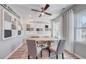 Contemporary office space with a table desk, comfortable chairs, and a large window for plenty of natural light at 315 River Edge Dr., Myrtle Beach, SC 29588