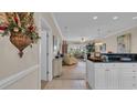 Warm living room flows from kitchen with access to the outdoors at 4142 Hibiscus Dr. # 102, Little River, SC 29566