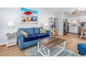 Cozy living room with comfortable seating and beach-themed decor at 4201 N Ocean Blvd. # Ocean View, Myrtle Beach, SC 29572