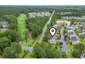 Aerial view of home near golf course, showing proximity to community amenities at 448 Mahogany Dr. # 201, Murrells Inlet, SC 29576