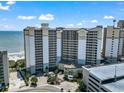 A high angle view of the multi-story hotel and surrounding landscape including the beach and ocean at 4800 S Ocean Blvd. # 920, North Myrtle Beach, SC 29582