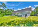 Spacious backyard featuring a fenced-in yard, above ground pool and a wooded border for added privacy at 4867 Wolf Trail, Conway, SC 29527
