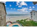 Wonderful overhead of community pool, beach and ocean, offering a great vacation lifestyle at 618 N Waccamaw Dr. # B7, Garden City Beach, SC 29576