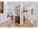 Inviting foyer with tile flooring and an open view to the kitchen and living areas at 637 Botany Loop # 64, Murrells Inlet, SC 29576