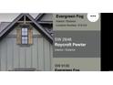 Exterior color: Evergreen Fog with Roycroft Pewter trim and wood shutters at 8016 Old Reaves Ferry Rd., Conway, SC 29526