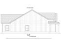 Side view of single story home with shingled roof and siding, 2 rectangular windows at Lot 1-A Fairlane Rd., Loris, SC 29569