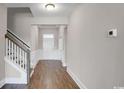 Inviting entryway with wood floors, white trim, and lots of natural light at 1004 Fowler Rd., Conway, SC 29526