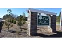 The Oak Hollow community sign is on display with the neighborhood name at 1014 Black Locust Pl., Longs, SC 29568