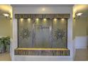 Attractive lobby water feature with recessed lighting adding elegance to the entryway at 2180 Waterview Dr. # 738, North Myrtle Beach, SC 29582