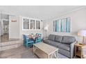 Comfortable living space with cozy seating, a dining area, and serene decor creates a relaxing atmosphere at 4800 S Ocean Blvd. # 1524, North Myrtle Beach, SC 29582