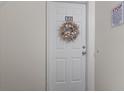 Front door with decorative wreath at 500 Fairway Village Dr. # J-7, Myrtle Beach, SC 29588