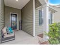 Cozy front porch with comfortable seating, creating a welcoming entrance to the home at 5018 Oat Fields Drive, Myrtle Beach, SC 29588