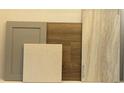 Elegant design scheme features neutral-toned cabinets, wood flooring, and light-colored countertops for a sophisticated look at 524 Sheepbridge Way, Loris, SC 29569