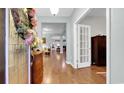 Open foyer with hardwood floors flowing into the spacious living areas at 698 Lafayette Park Dr., Little River, SC 29566