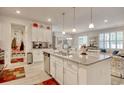 Bright kitchen with granite counters and stainless steel appliances at 160 Juniata Loop, Little River, SC 29566