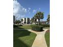 Community amenities including a pool, green space, and lounge area at 417 S Dunes Dr., Pawleys Island, SC 29585
