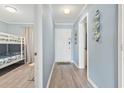 Hallway with view of bunk beds with coastal decor and light blue walls at 5905 South Kings Hwy. # A337, Myrtle Beach, SC 29575