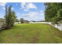 Large, fenced backyard offering privacy and plenty of room for recreation and relaxation at 195 Black Pepper Loop, Little River, SC 29566