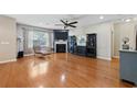 Spacious living room with fireplace, hardwood floors, and elegant furnishings at 2709 Eton St., Myrtle Beach, SC 29579