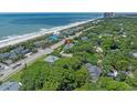 Aerial view showcasing proximity to the beach and ocean views at 3907 N Ocean Blvd., Myrtle Beach, SC 29572