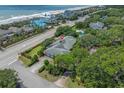Aerial image highlighting the property with mature landscaping and surrounding neighborhood at 3907 N Ocean Blvd., Myrtle Beach, SC 29572