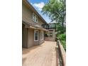 Spacious outdoor deck perfect for entertaining and relaxing with a view of the backyard at 469 White Heron Ct. Sw, Sunset Beach, NC 28468