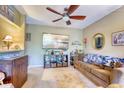 Well decorated living room with TV and comfortable seating at 1102 Indian Wells Ct. # 2, Garden City Beach, SC 29576