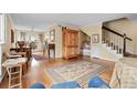 Inviting living room with hardwood floors and staircase at 315 72Nd Ave. N # A, Myrtle Beach, SC 29572