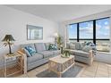 Inviting living room with comfortable seating and scenic ocean views at 523 S Ocean Blvd. # 305, North Myrtle Beach, SC 29582