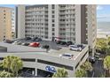 View of the parking garage with access to the condos near the beach at 523 S Ocean Blvd. # 305, North Myrtle Beach, SC 29582