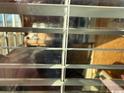 Obstructed view from behind window blinds at 5732 N Ocean Blvd., Myrtle Beach, SC 29577