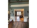 Open entryway flows into the living room, featuring hardwood floors and traditional decor at 1872 Harris Short Cut Rd., Conway, SC 29526