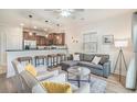 Comfortable living room with modern furniture, stylish decor, with open concept into the kitchen at 2701 Kashton Dr., Myrtle Beach, SC 29577