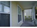 View of the home's inviting front porch area, showcasing the home's curb appeal and outdoor space at 433 Emerson Dr., Myrtle Beach, SC 29579