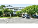 A well-maintained two-story condo with lush greenery, perfect for relaxed living at 5825 Catalina Dr. # 833, North Myrtle Beach, SC 29582