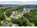 Aerial view of the community with lush trees, a golf course, and multiple residential buildings at 1428 Lanterns Rest Rd. # 1428, Myrtle Beach, SC 29579