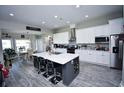 Beautiful kitchen features a large center island, stainless steel appliances, and modern finishes at 1455 Whooping Crane Dr., Conway, SC 29526