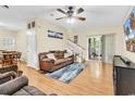 Inviting living room features wood floors, neutral paint, and access to the backyard at 3969 Murrells Inlet Rd., Murrells Inlet, SC 29576