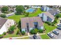 Overhead view showcasing the townhome's proximity to the tennis courts and pool with green space at 4049 Fairway Lakes Dr. # 4049, Myrtle Beach, SC 29577
