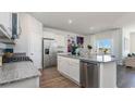 Modern kitchen featuring an island, stainless steel appliances, and white cabinets at 422 Glade Ct., Loris, SC 29569