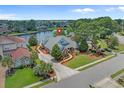 Beautiful aerial view of home with lake access and manicured landscaping at 904 Kalmia Ct., Myrtle Beach, SC 29579