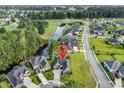 An aerial view of the home, backing up to a scenic golf course and water feature at 1009 Maccoa Dr., Conway, SC 29526