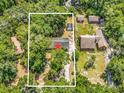 Aerial view of the property showcasing its wooded lot and proximity to neighboring homes at 823 Bellamy Ave., Murrells Inlet, SC 29576